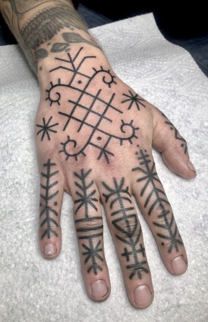 Collective Art & Tattoo Studio - Hand line tattoo